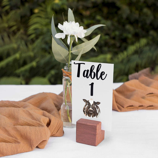 Cowhide Table Numbers The Farmer Wants a Wedding | Farm and equestrian themed table numbers